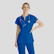 Person wearing a blue scrub set with a stethoscope on a light gray background